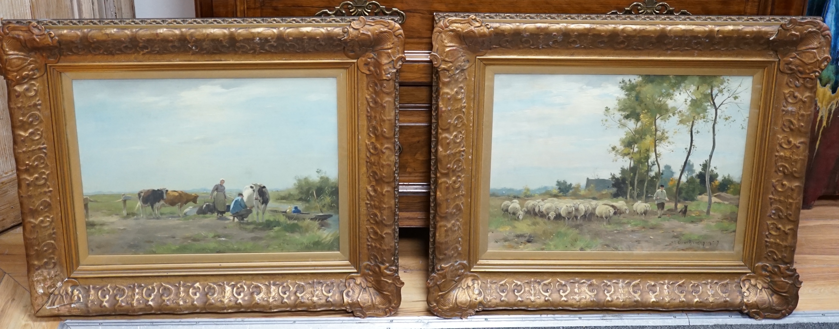 Adrianus Johannes Groenewegen (1874-1963), pair of oils on canvas, Shepherd and flock and cow herder in landscapes, signed, 32 x 43cm